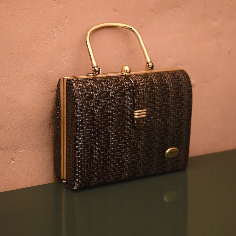 Quality vintage handbags and purses will gain a rich patina over time. Embrace it!